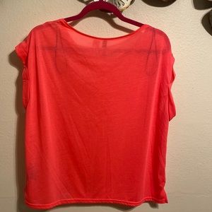 DIVIDED H & M.     Neon orange tank.  Size 10
